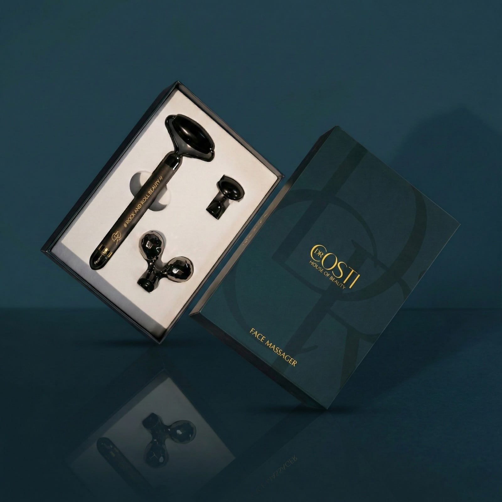 Set of massagers in a 'COSTI' box on a dark background